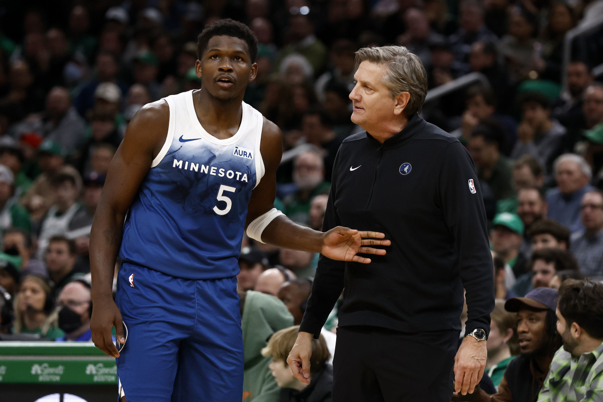Jan 10, 2024; Boston, Massachusetts, USA; Minnesota Timberwolves head coach Chris Finch talks with guard Anthony Edwards (5) during the second quarter against the Boston Celtics at TD Garden.